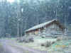 Snow at the Centre's Log Cabin